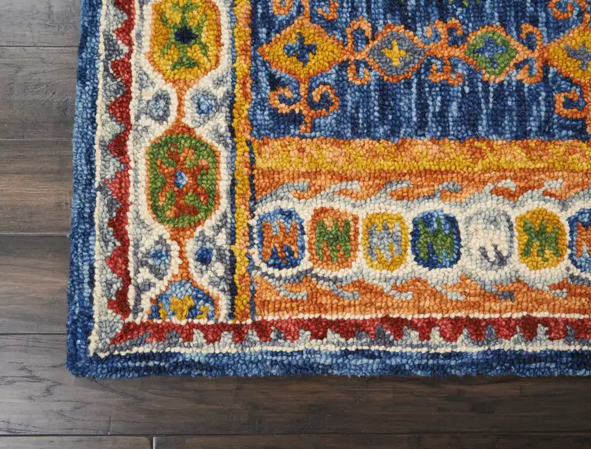 Navy Blue Orange And Green Wool Floral Hand Tufted Distressed Area Rug Photo 4