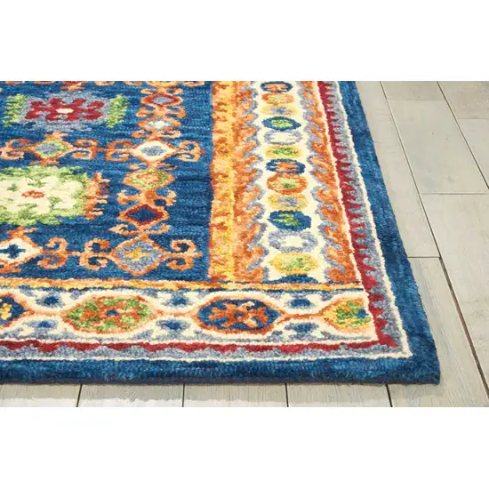 Navy Blue Orange And Green Wool Floral Hand Tufted Distressed Area Rug Photo 4