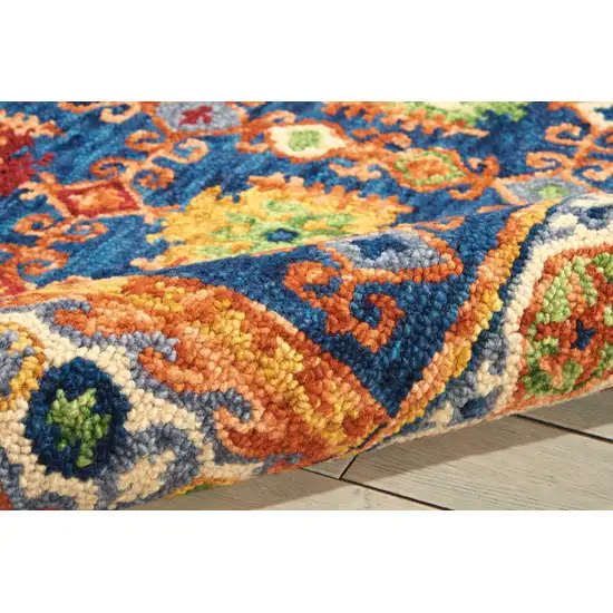 Navy Blue Orange And Green Wool Floral Hand Tufted Distressed Area Rug Photo 6