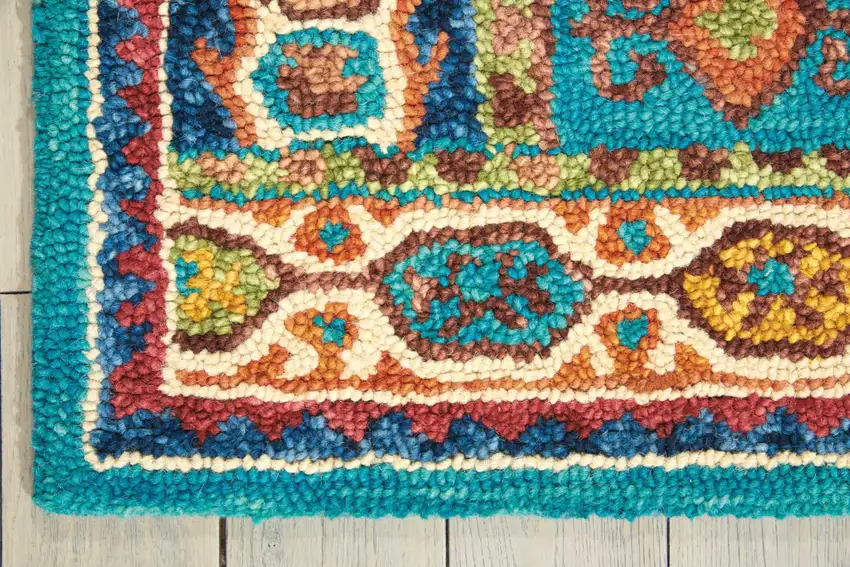 Navy Blue Orange And Green Wool Floral Hand Tufted Distressed Area Rug Photo 4