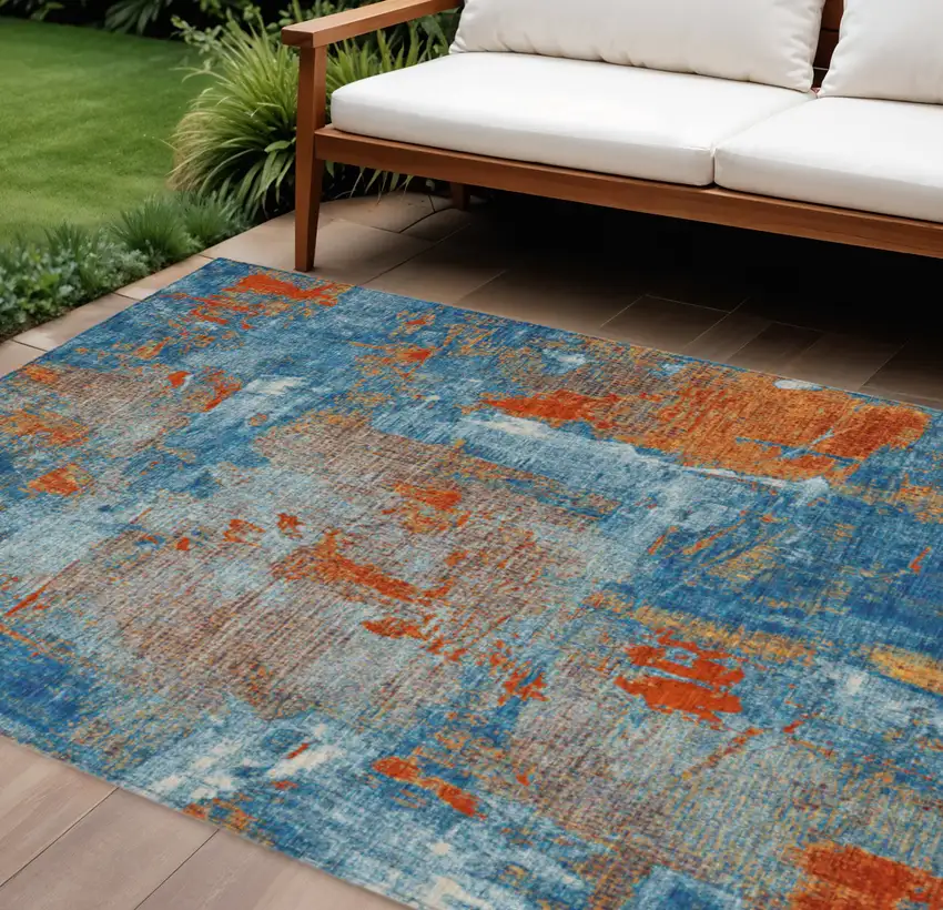 Navy Blue Orange And Ivory Abstract Washable Indoor Outdoor Area Rug Photo 1