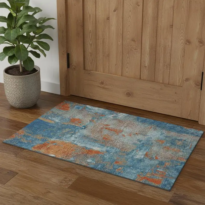 Navy Blue Orange And Teal Abstract Washable Area Rug With UV Protection Photo 1