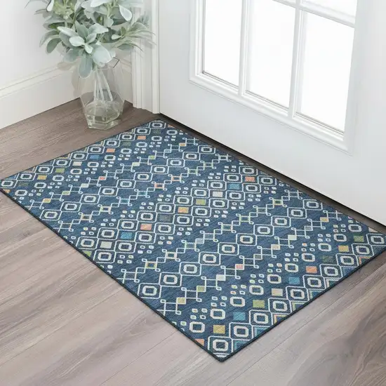 Navy Blue Peach And Gold Southwestern Washable Area Rug With UV Protection Photo 1