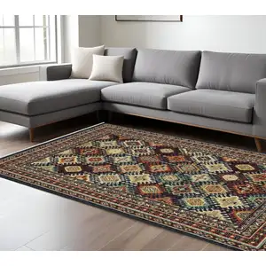 Photo of Navy Blue Red And Orange Oriental Area Rug With Fringe