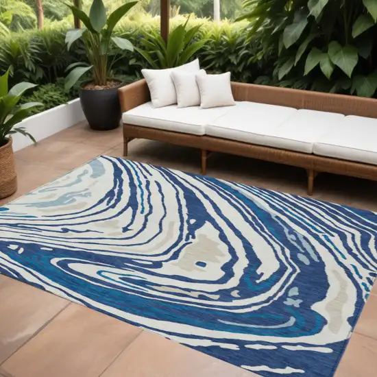 Navy Blue Teal Blue And Ivory Abstract Washable Indoor Outdoor Area Rug Photo 1