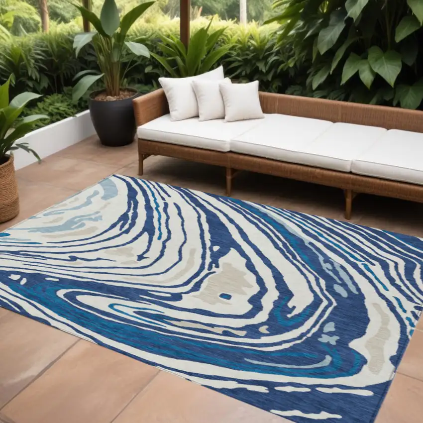 Navy Blue Teal Blue And Ivory Abstract Washable Indoor Outdoor Area Rug Photo 1