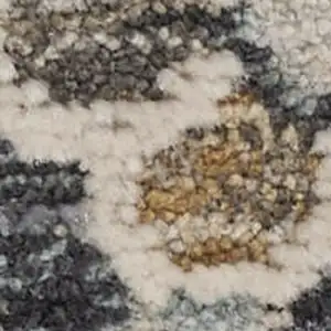 Photo of Navy Blue Yellow And Ivory Oriental Distressed Area Rug With Fringe