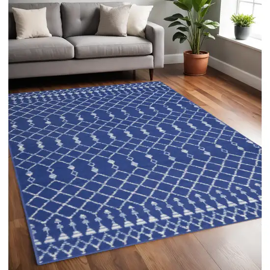 Ivory And Blue Geometric Area Rug Photo 2
