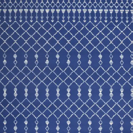 Ivory And Blue Geometric Area Rug Photo 1