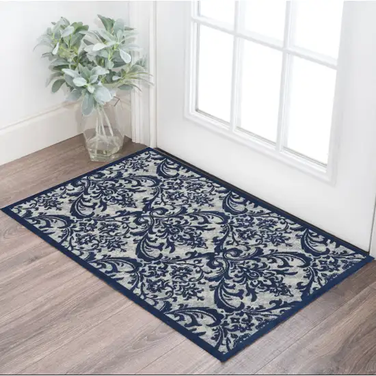 Navy Blue and Ivory Damask Distressed Area Rug Photo 1
