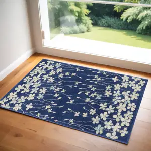 Photo of Navy Blue and Ivory Floral Area Rug