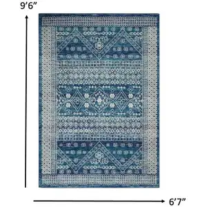 Photo of Navy Blue and Ivory Persian Motifs Area Rug
