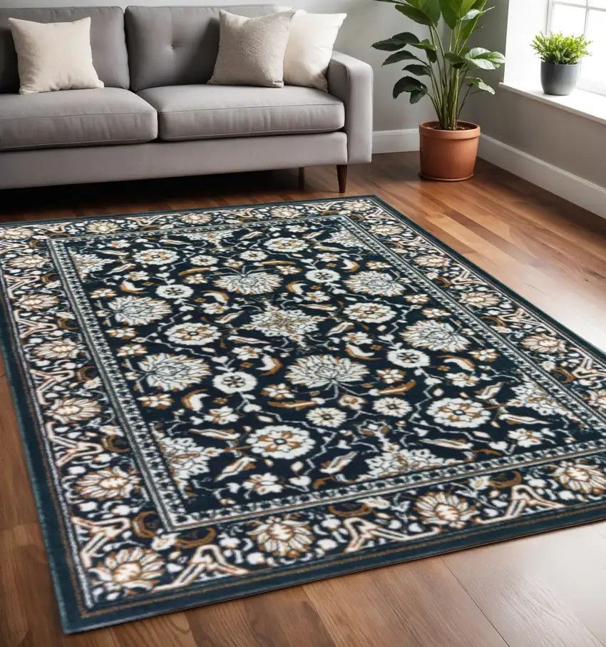 Navy Caramel And Ivory Oriental Power Loom Stain Resistant Area Rug Photo 1