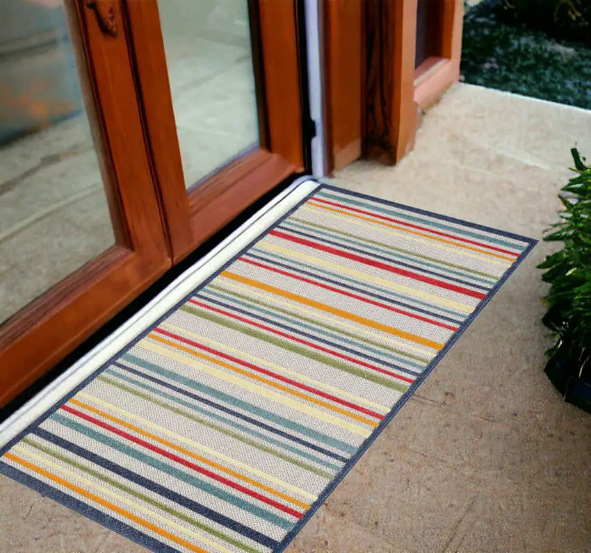 Ivory And Blue Striped Stain Resistant Indoor Outdoor Area Rug Photo 1