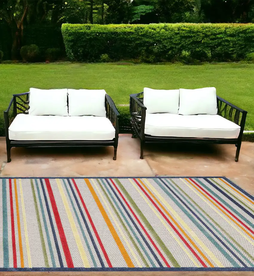 Ivory And Blue Striped Stain Resistant Indoor Outdoor Area Rug Photo 1