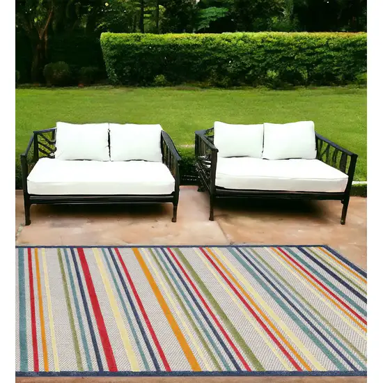 Ivory And Blue Striped Stain Resistant Indoor Outdoor Area Rug Photo 1