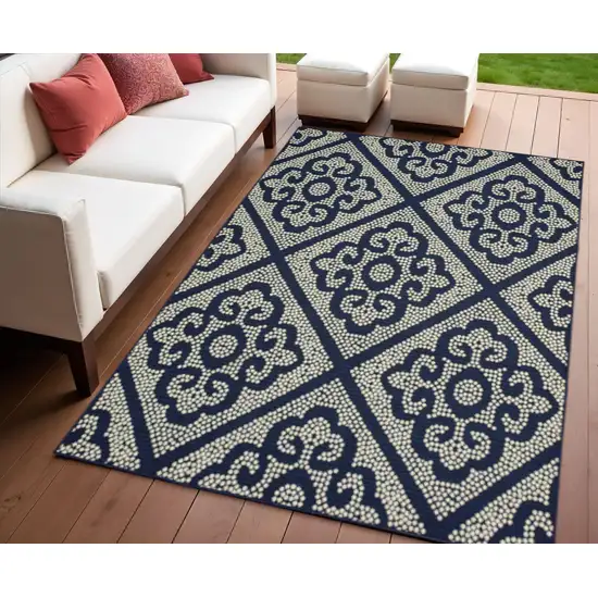 Blue and Ivory Geometric Stain Resistant Indoor Outdoor Area Rug Photo 1