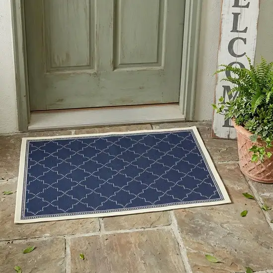Blue and Ivory Geometric Stain Resistant Indoor Outdoor Area Rug Photo 1