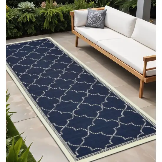 Blue and Ivory Geometric Stain Resistant Indoor Outdoor Area Rug Photo 1