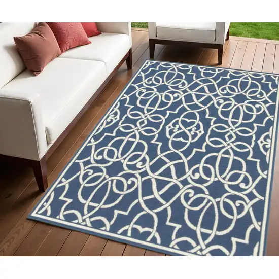 Blue and Ivory Geometric Stain Resistant Indoor Outdoor Area Rug Photo 1