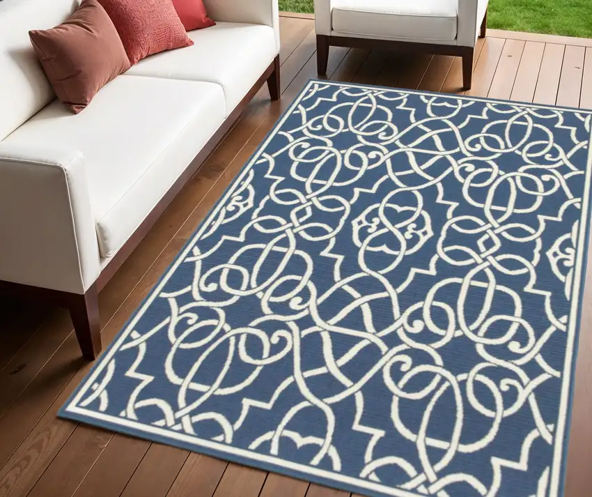 Blue and Ivory Geometric Stain Resistant Indoor Outdoor Area Rug Photo 1