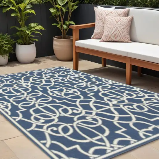 Blue and Ivory Geometric Stain Resistant Indoor Outdoor Area Rug Photo 1