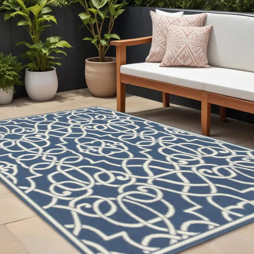 Blue and Ivory Geometric Stain Resistant Indoor Outdoor Area Rug Photo 1