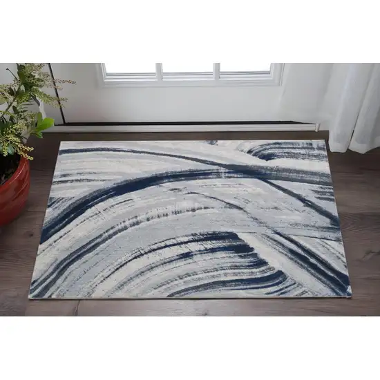 Ivory and Blue Abstract Area Rug Photo 2