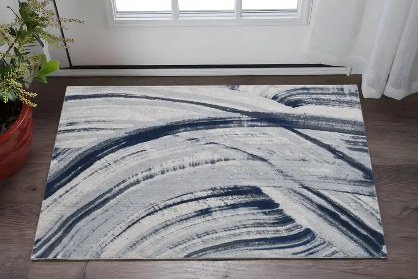 Ivory and Blue Abstract Area Rug Photo 2