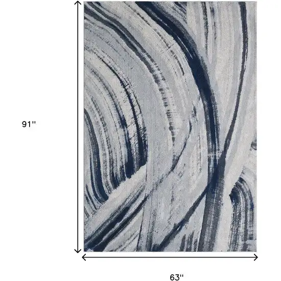 Ivory and Blue Abstract Area Rug Photo 9