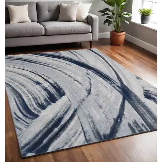 Ivory and Blue Abstract Area Rug Photo 2