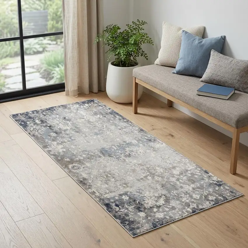 Navy And Beige Distressed Vines Area Rug Photo 1