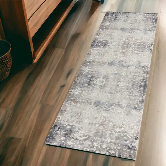 2' X 6' Navy And Beige Distressed Vines Area Rug Photo 1