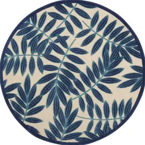 Photo of Navy and Beige Leaves Indoor Outdoor Area Rug