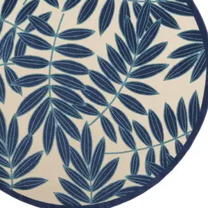 Photo of Navy and Beige Leaves Indoor Outdoor Area Rug