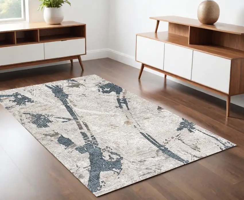Blue and Ivory Abstract Power Loom Area Rug Photo 1