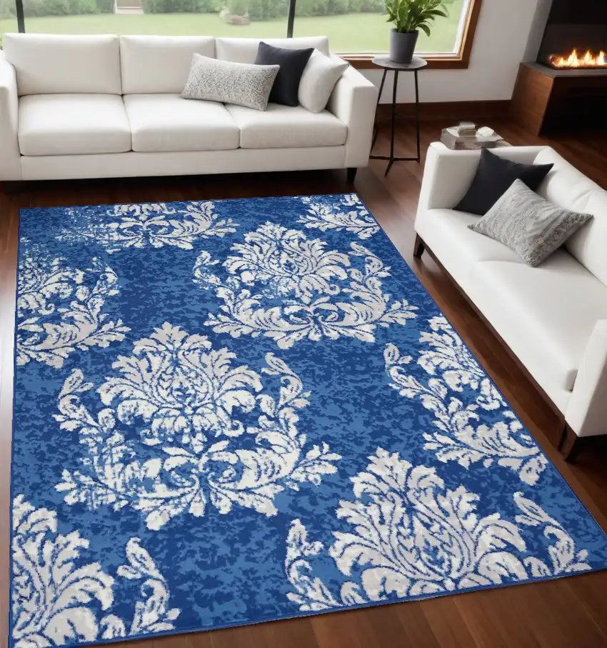 Blue And Ivory Floral Dhurrie Area Rug Photo 1