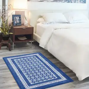 Photo of Navy and Ivory Geometric Area Rug