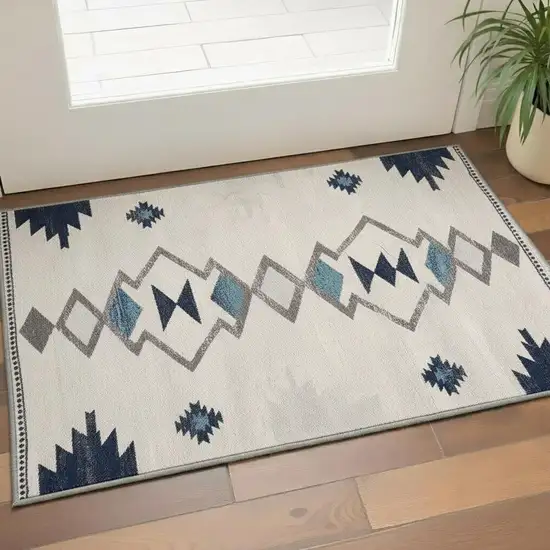 Blue and Ivory Southwestern Area Rug Photo 1