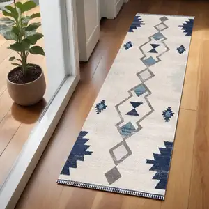 Photo of Navy and Ivory Tribal Pattern Area Rug