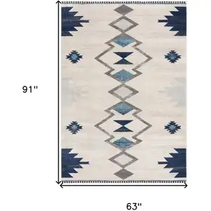 Photo of Navy and Ivory Tribal Pattern Area Rug
