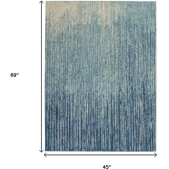 Blue And Ivory Abstract Area Rug Photo 9