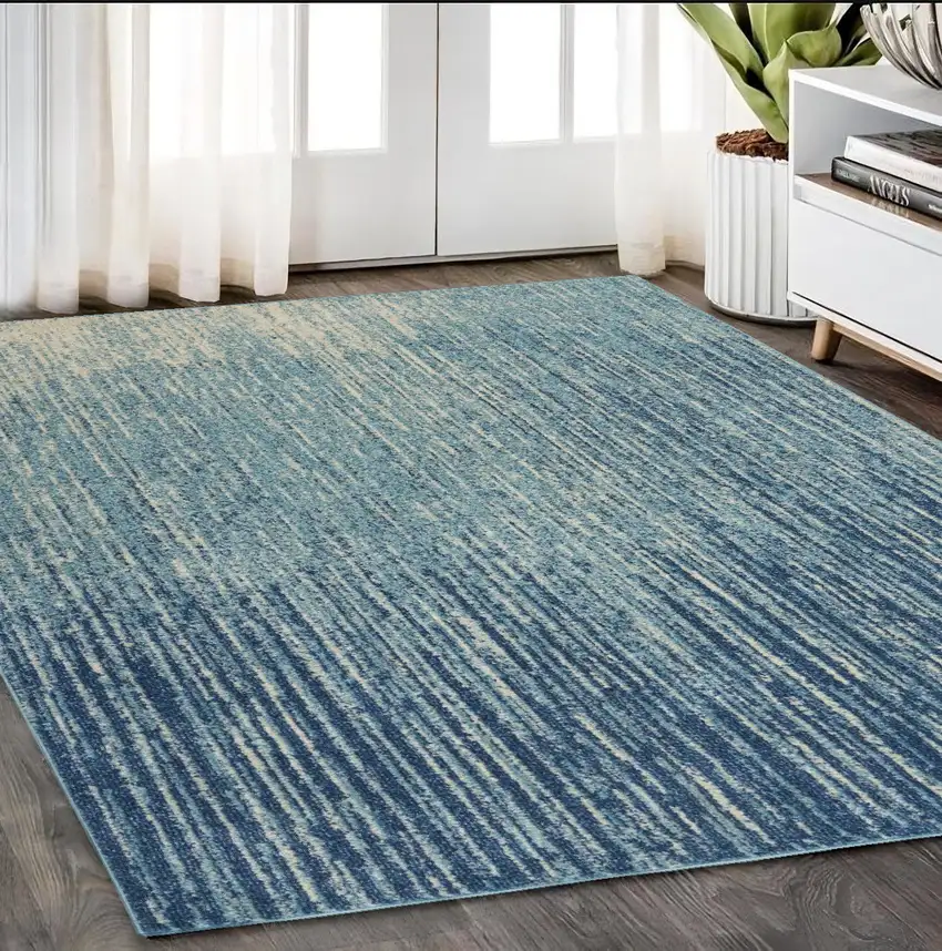 Ivory And Blue Abstract Stripes Power Loom Area Rug Photo 1