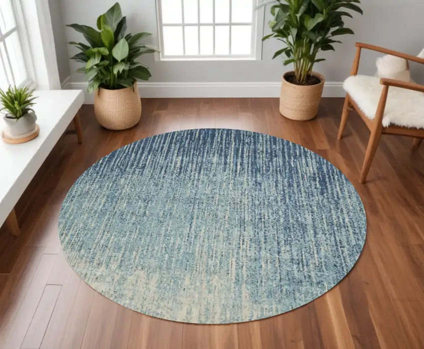 8' Ivory And Blue Round Abstract Power Loom Area Rug Photo 1