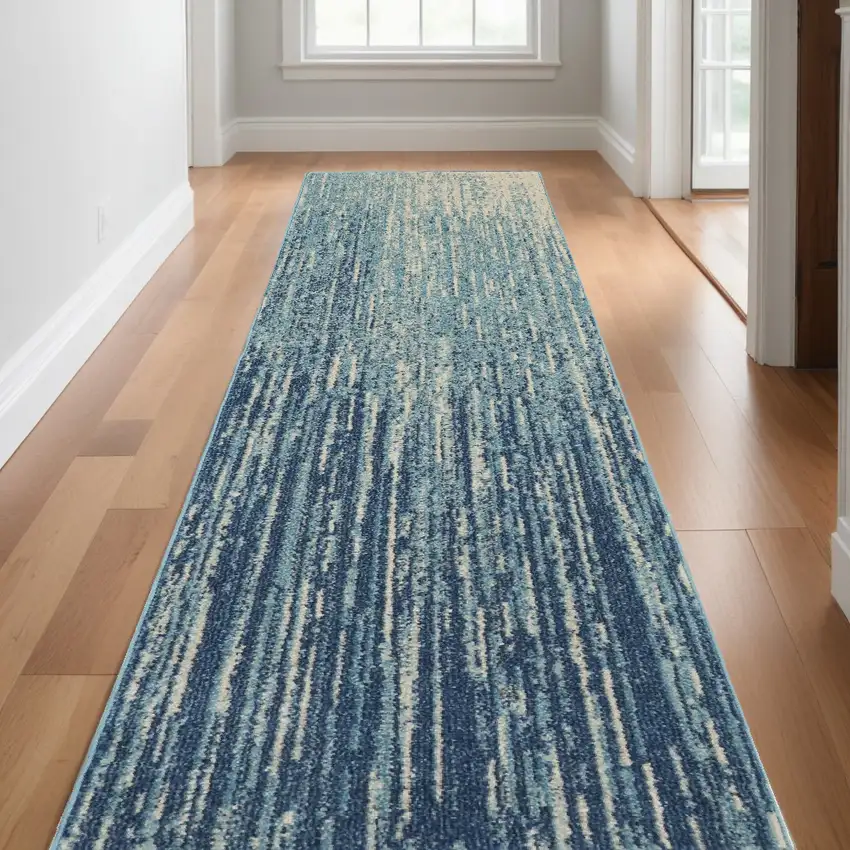 10' Ivory And Blue Abstract Power Loom Runner Rug Photo 1