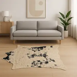Photo of Off White Black and Gold Faux Cowhide Washable Area Rug