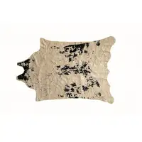 Photo of Off White Black and Gold Faux Cowhide Washable Area Rug