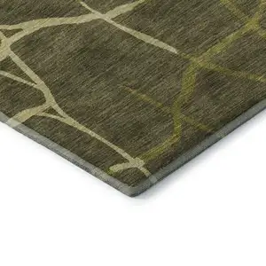 Photo of Olive Green And Beige Abstract Geometric Washable Area Rug With UV Protection