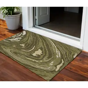 Photo of Olive Green And Beige Abstract Washable Indoor Outdoor Area Rug