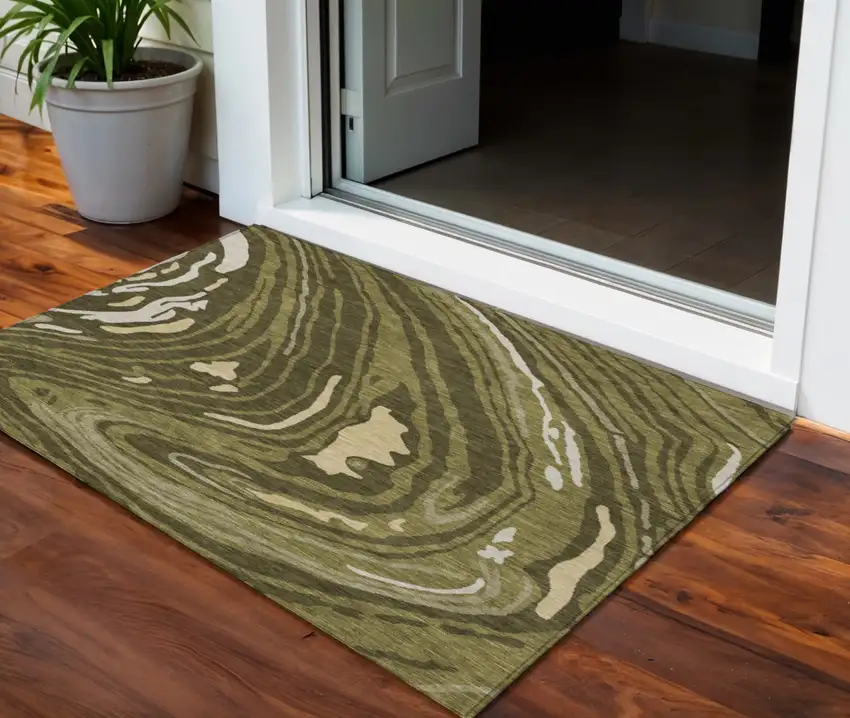 Olive Green And Beige Abstract Washable Indoor Outdoor Area Rug Photo 1